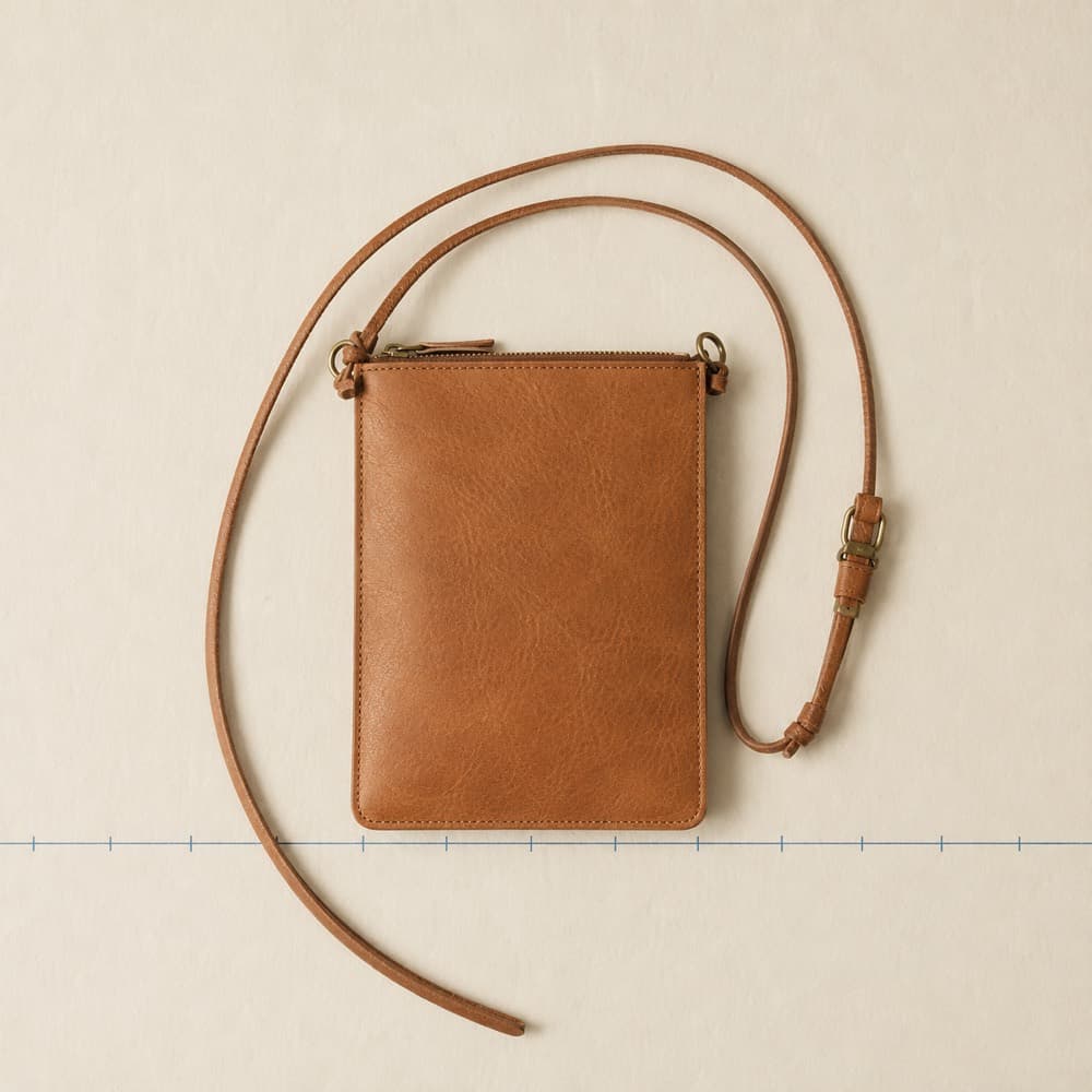 Neck Pouch Slim — Flat enough to wear under a shirt for nine hours.